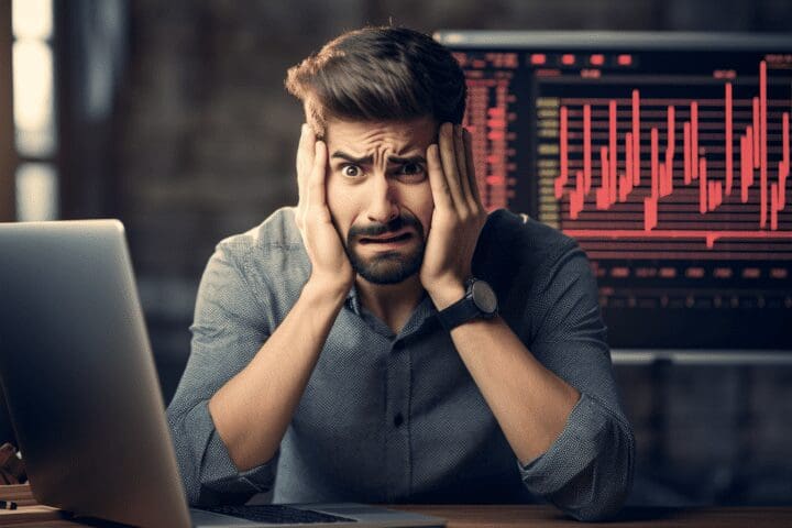 Image: Person frustrated in front of computer with technical error message
Description: Technical difficulties hurting productivity